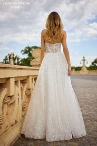 Herm’s Bridal IKSAN wedding dress – A-line, romantic, embellished, flowy, lace and tulle, plunging neckline, corset bodice, sweetheart neckline, bare shoulders, no train