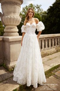 Herm’s Bridal INALA wedding dress – A-line, romantic, flowy, lace and tulle, plunging neckline, corset bodice, bare shoulders, no train