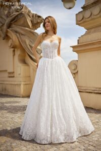Herm’s Bridal INDIO wedding dress – A-line, princess, romantic, embellished, lace and tulle, plunging neckline, corset bodice, bare shoulders, long sleeves, no train