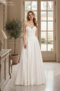 Herm’s Bridal CANCAYA wedding dress – A-line, princess, simple, embellished, lace and satin, plunging neckline, corset bodice, sweetheart neckline, bare shoulders, long sleeves, short, with train
