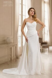 Suknia ślubna Herm’s Bridal CANNES – z perełkami, prosta, syrena, zdobiona, z satyny i tiulu, głęboki dekolt, gorsetowa góra, dekolt w literę V, odkryte ramiona, długa, z trenem (z odpinaną spódnicą)